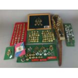 Large collection of military badges and buttons