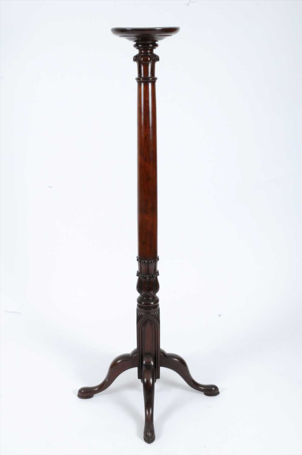 A tall 19th century mahogany torchere stand,