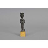 A small ancient Egyptian bronze statuette