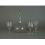 Engraved decanter and three matching glasses