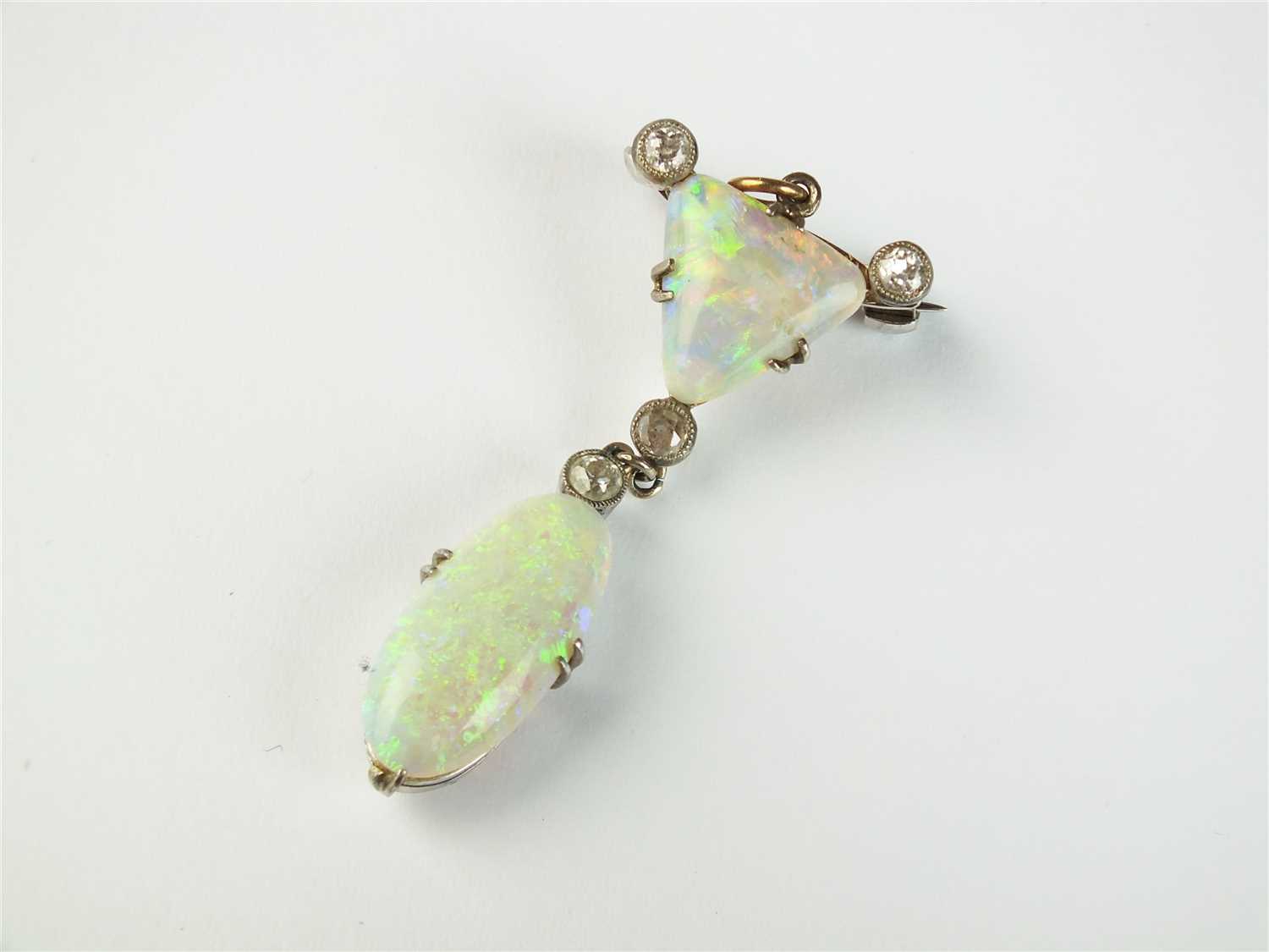 An opal and diamond pendant/brooch