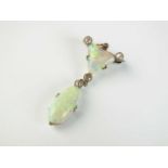 An opal and diamond pendant/brooch