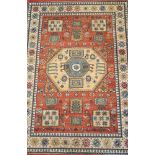 A machine made rug of Kazak design