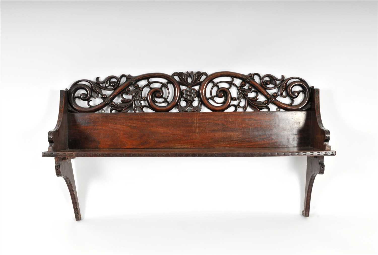 A Regency Anglo-Indian carved rosewood wall shelf