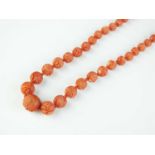 A carved coral necklace