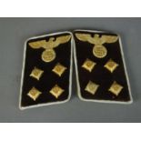 A matched set of German Third Reich collar tabs for a Gemeinschaftleiter at Kreis level, constructed