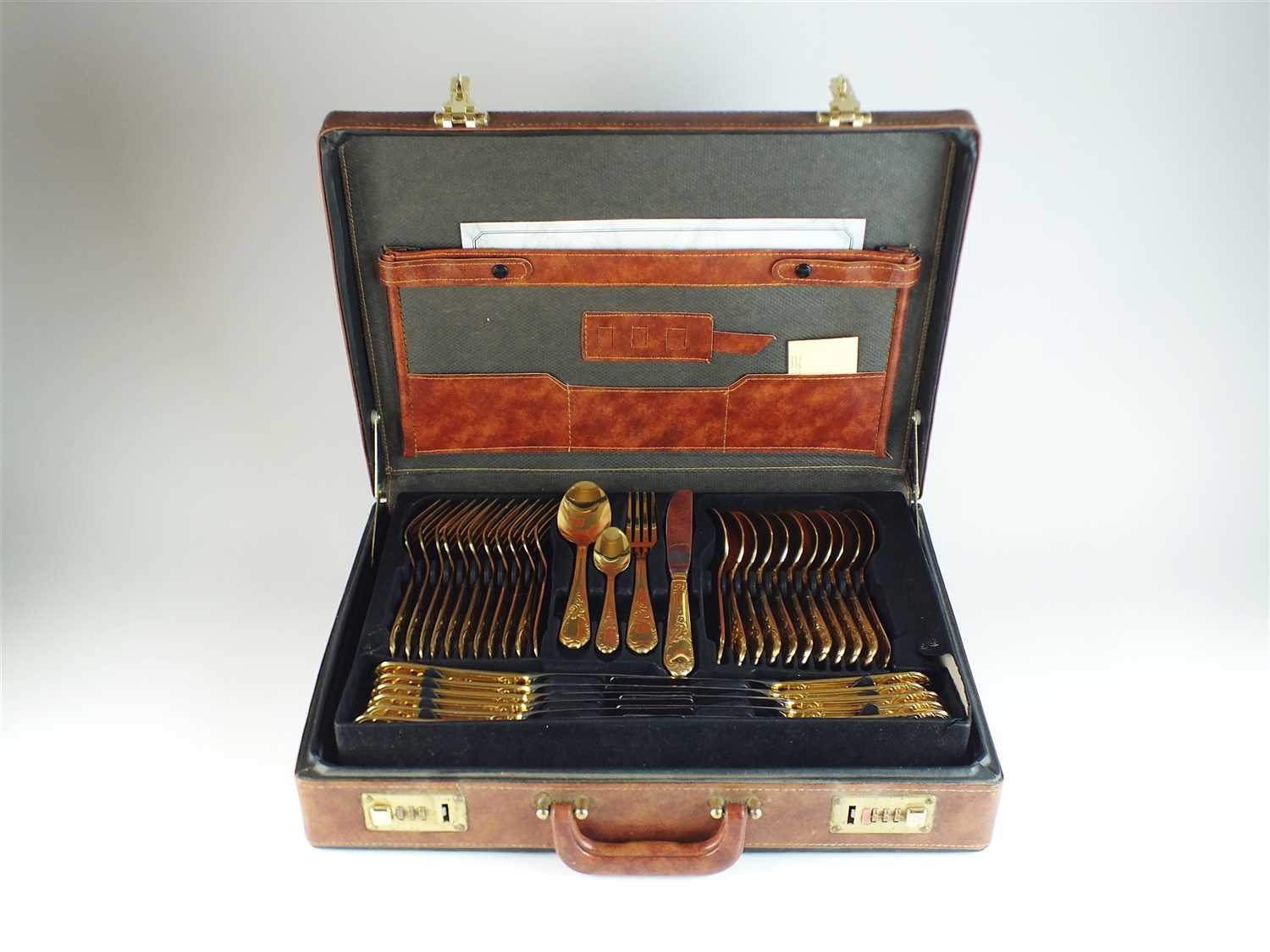 A cased set of Solingen gold plated cutlery