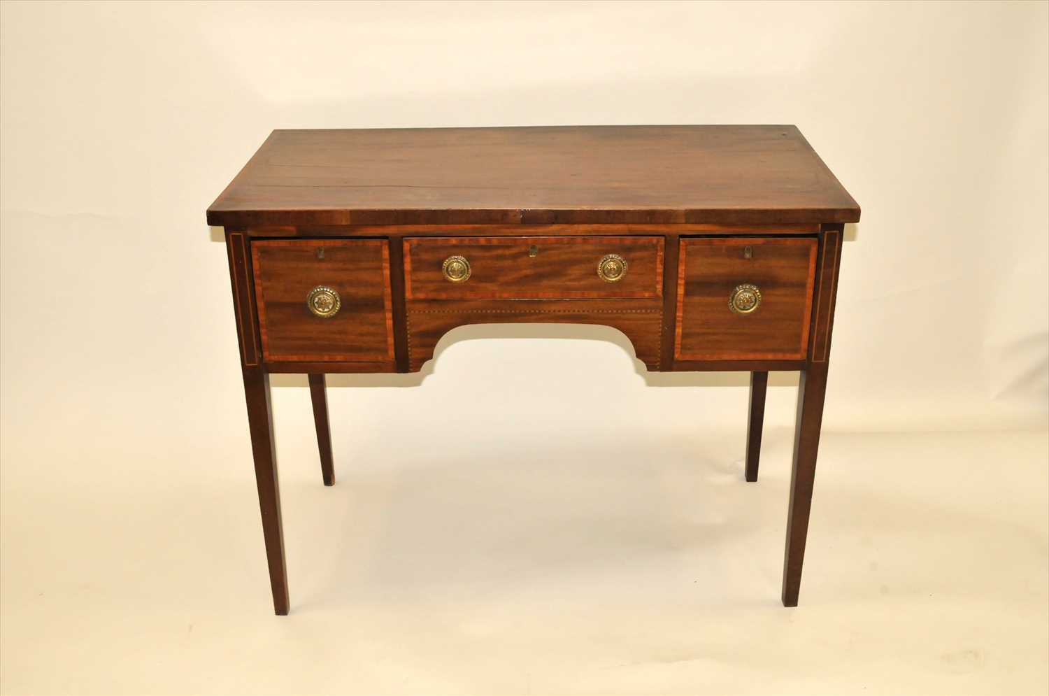 An Edwardian mahogany desk