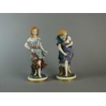 A pair of Royal Worcester porcelain figures