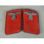 Two matched sets of Gau level collar tabs