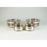 Two pairs of silver coasters