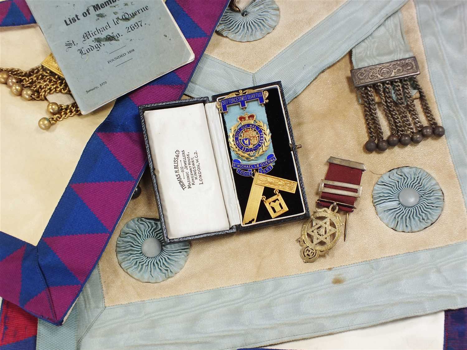 A suitcase containing a collection of Masonic Regalia