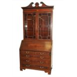 A late 19th century mahogany bureau bookcase
