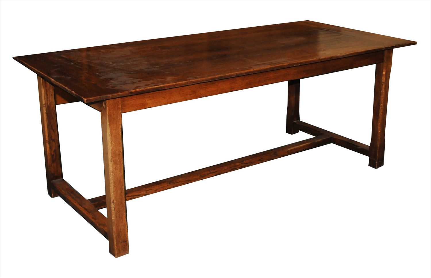 A reproduction rustic oak refectory table