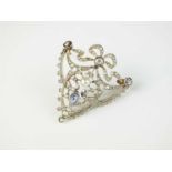 An early 20th century diamond, pearl and sapphire brooch
