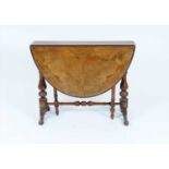 A Victorian burr walnut veneered and shallow carved tea table
