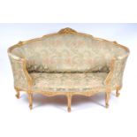 A 19th century French carved gilt wood framed upholstered parlour sofa