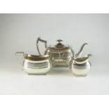 A George III three piece silver tea service