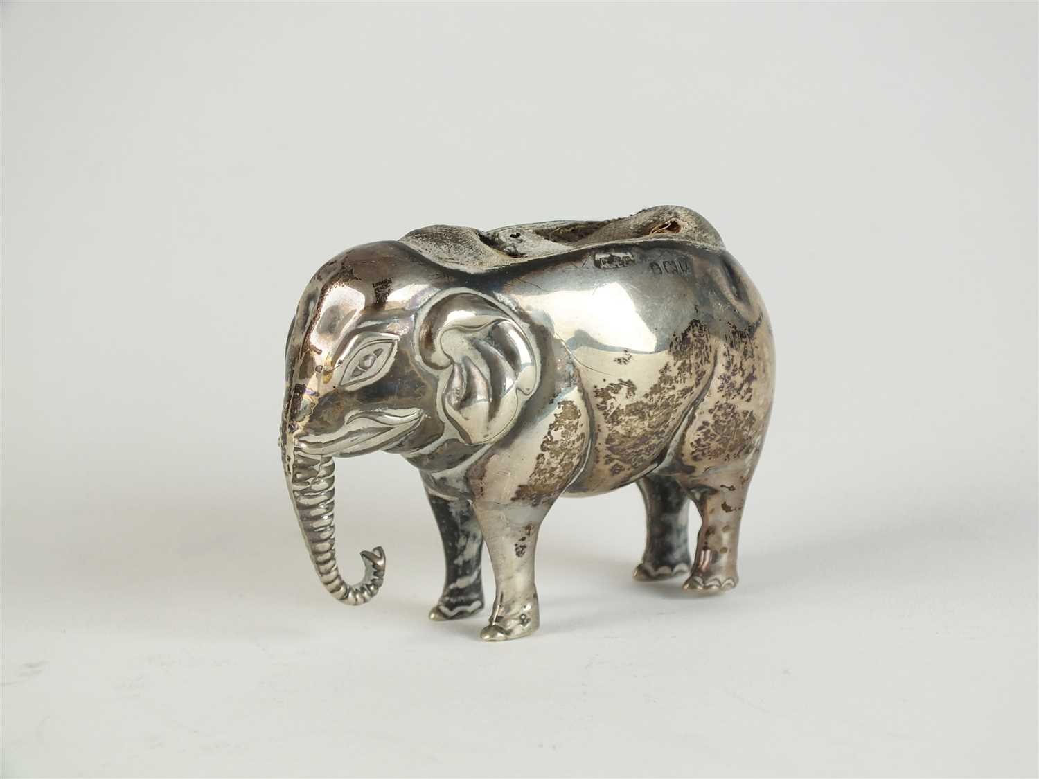 An Edwardian novelty silver pin cushion in the form of an elephant