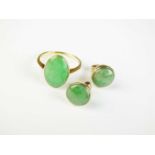 A jade ring and a pair of jade stud earrings