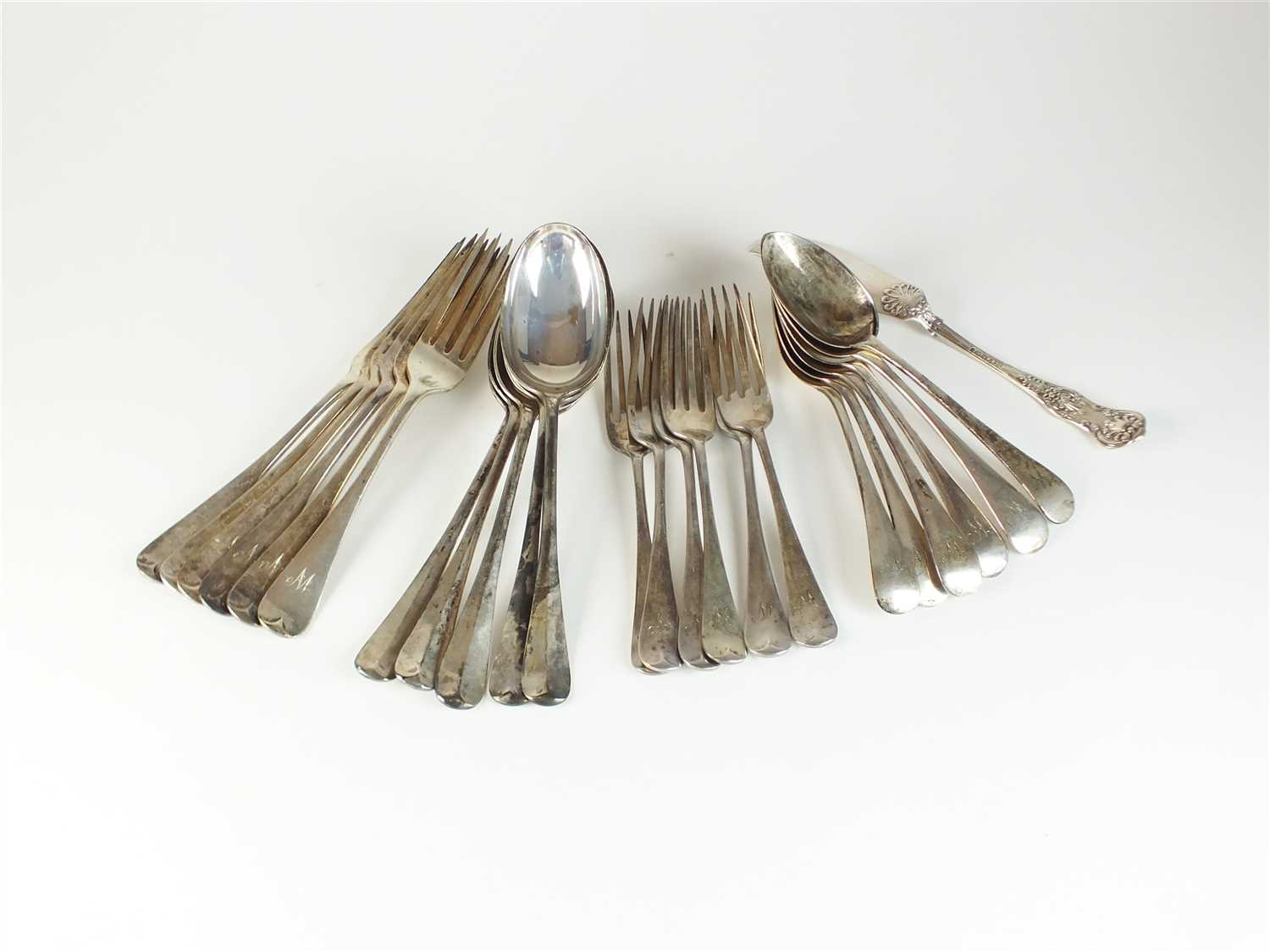 A part set of Old English pattern silver flatware