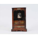A late Victorian oak smoker's cabinet and a Mason's ironstone washing set