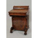 A Victorian burr walnut veneered davenport