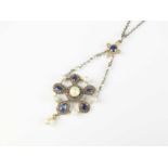An early 20th century sapphire, pearl and diamond pendant