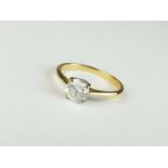 An 18ct gold single stone diamond ring