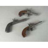Three mid-19th century percussion pistols