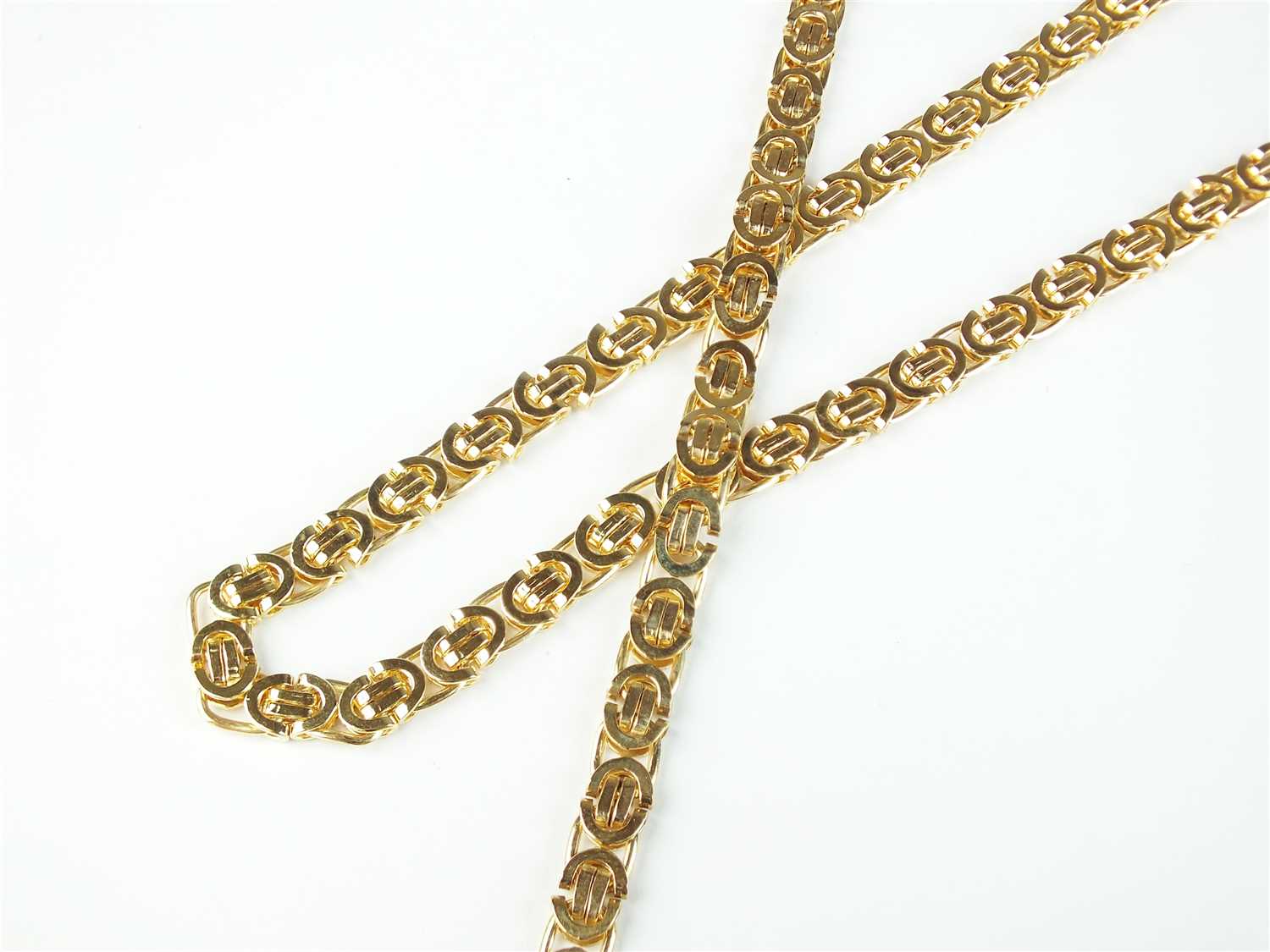 A 9ct gold necklace and bracelet suite