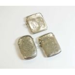 A collection of three silver vesta cases