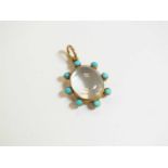 A 19th century turquoise and rock crystal locket pendant