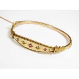 A 9ct gold Victorian hinged bangle