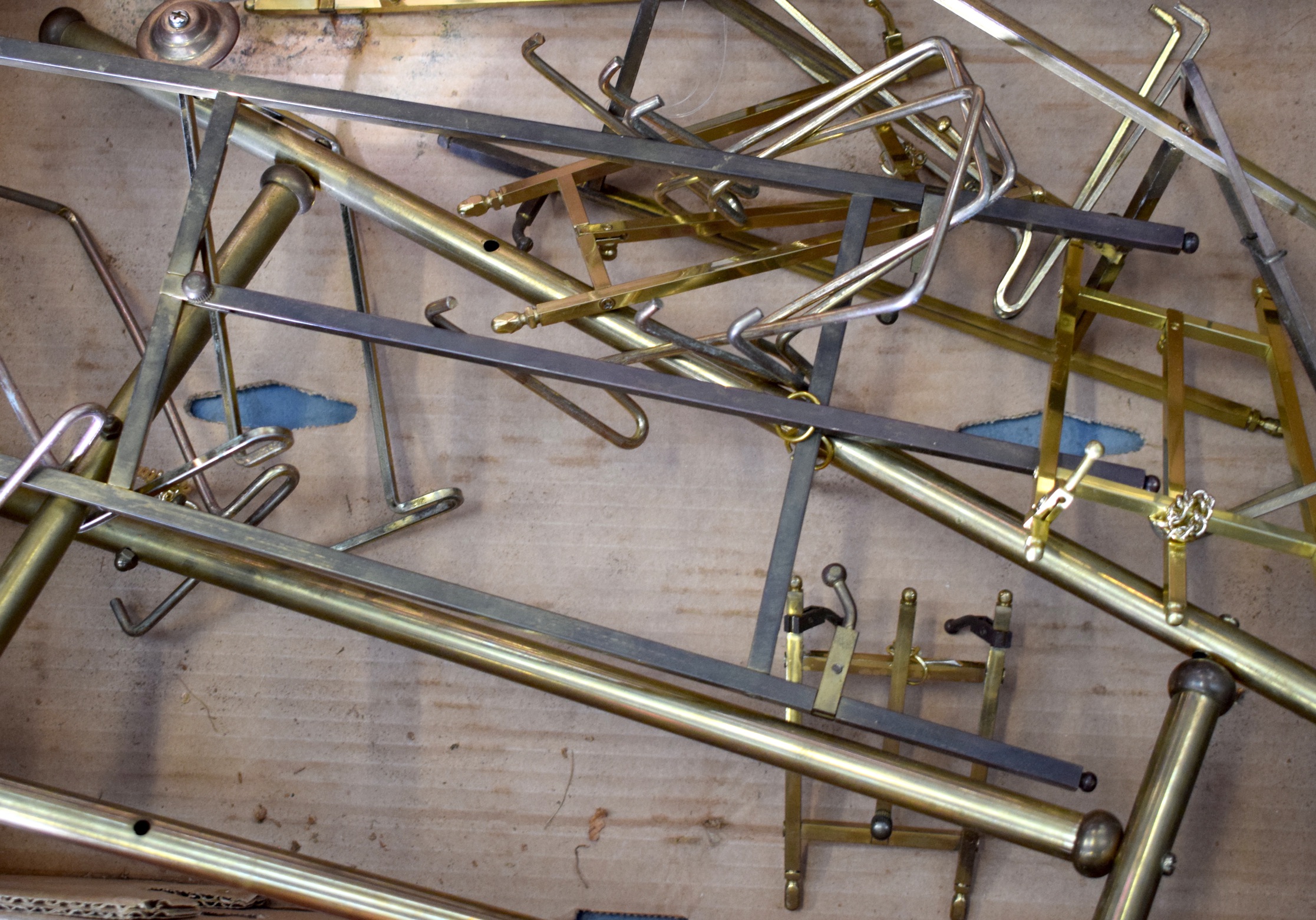 A GROUP OF BRASS EASELS, of varying size. (qty)