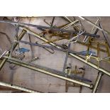 A GROUP OF BRASS EASELS, of varying size. (qty)