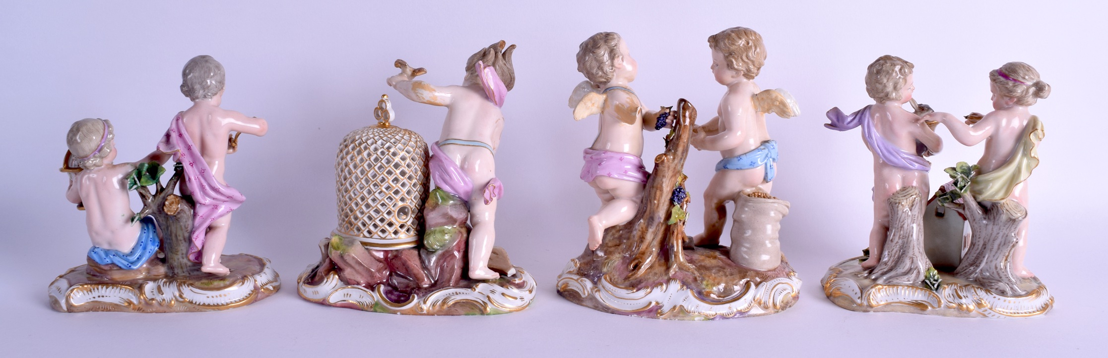 A SET OF 19TH CENTURY MEISSEN PORCELAIN FIGURAL GROUPS modelled in various forms. Largest 10 cm x 13 - Image 2 of 3