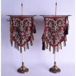 A PAIR OF VICTORIAN BEADWORK PANELS upon brass pedestal supports. 52 cm x 18 cm.