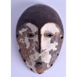 AN AFRICAN PAINTED TRIBAL MASK with white polychromed remnants. 22 cm x 13 cm.