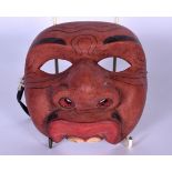 A BALINESE CARVED WOODEN BONDRES KELIHAN TOPENG DANCE MASK, formed as the proud, pompous comic. 14.5