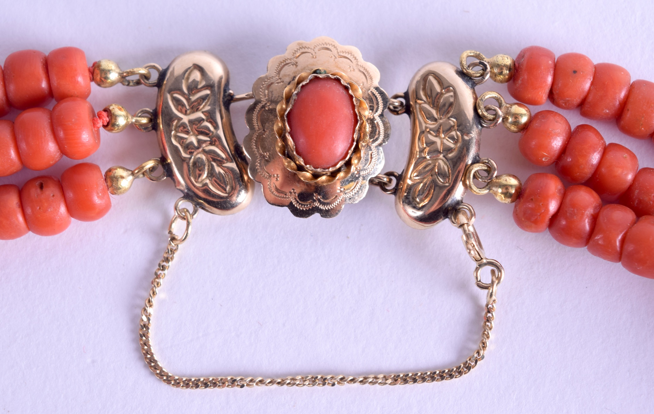 AN 18CT GOLD MOUNTED CORAL NECKLACE. 700 grams. Each strand 40 cm long, each bead 0.3 mm wide. - Image 2 of 3