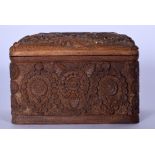 AN UNSUAL ANGLO INDIAN CARVED WOODEN CIGARETTE BOX, decorated with extensive foliage. 14.5 cm wide.