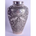 A GOOD 19TH CENTURY MIDDLE EASTERN INDO PERSIAN SILVER VASE decorated with Buddhistic beasts in