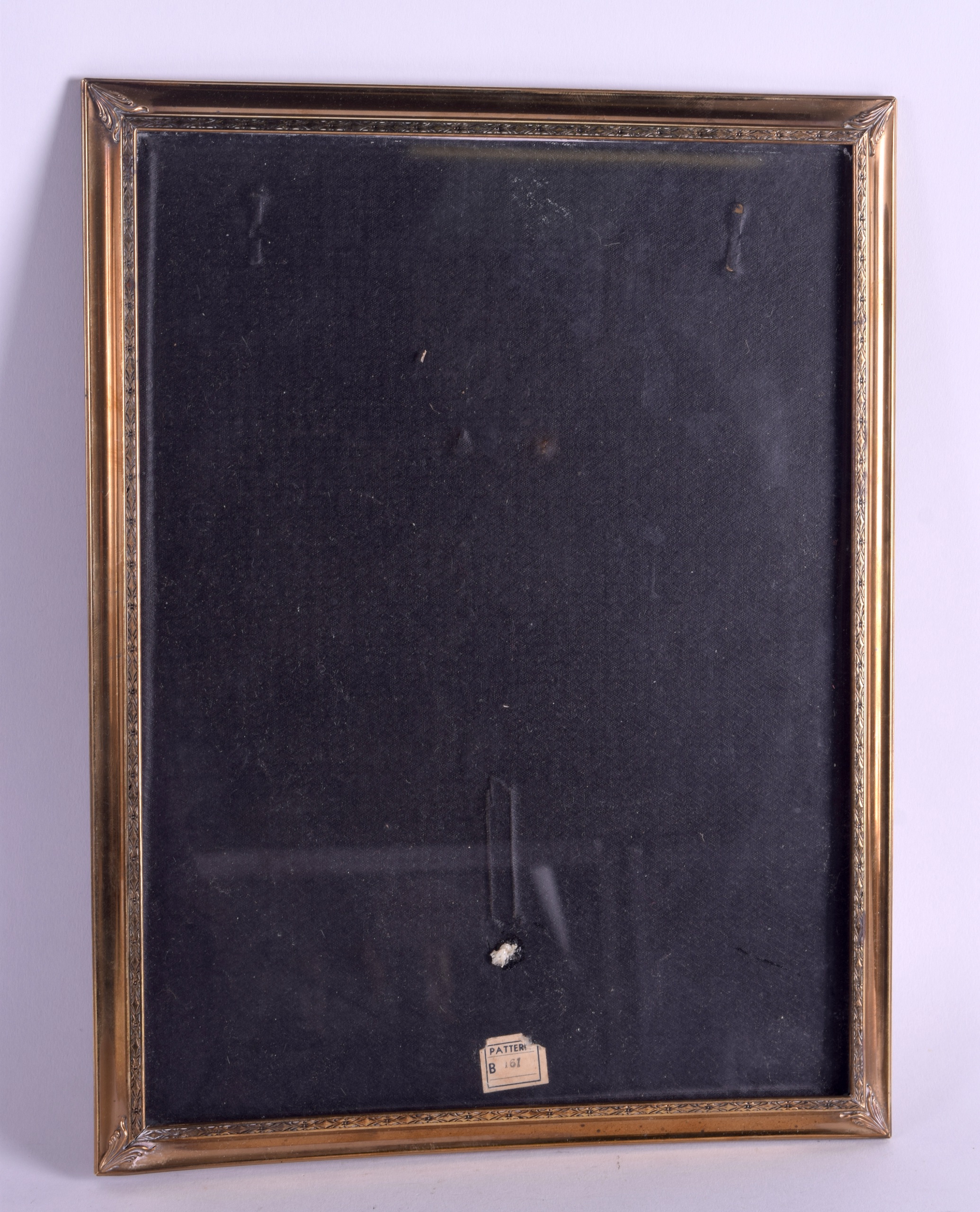 AN EDWARDIAN NEO CLASSICAL PHOTOGRAPH FRAME decorated with floral motifs. 25 cm x 33 cm.