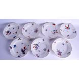 A SET OF SEVEN 18TH CENTURY OUD LOOSDRECHT PORCELAIN PLATES painted with floral sprays in the