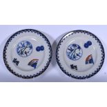 A PAIR OF WELSH AESTHETIC MOVEMENT POTTERY PLATES, decorated in the oriental taste. 26 cm wide.