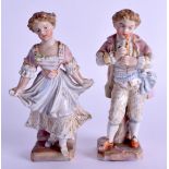 A SMALL PAIR OF 19TH CENTURY GERMAN PORCELAIN FIGURES modelled as a male and female. 12.5 cm high.