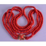 AN 18CT GOLD AND RED CORAL NECKLACE with coral inset clasp. 147 grams. 52 cm long.