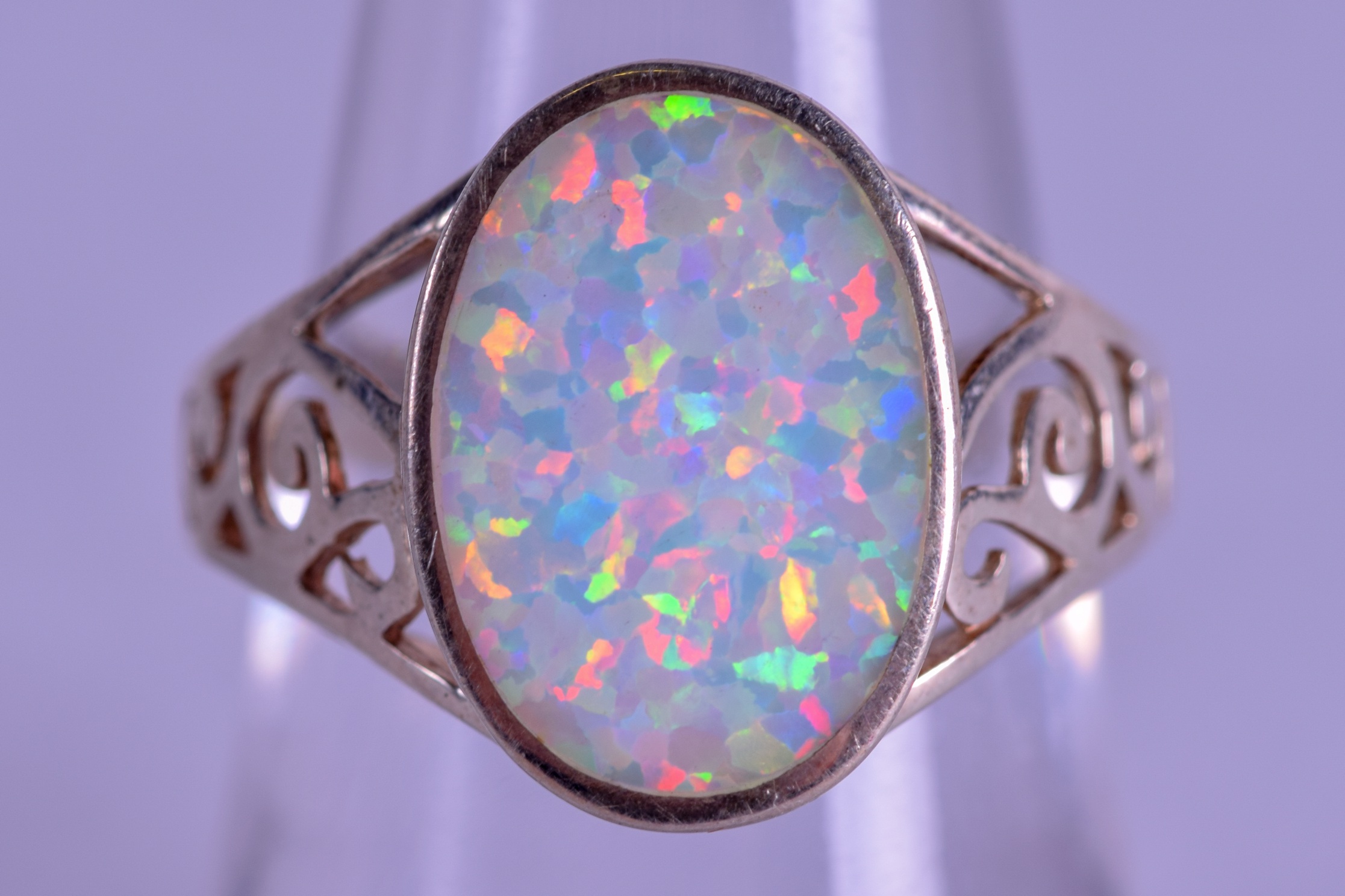 A SILVER AND OPAL RING. Size N/O.