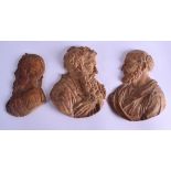 A SET OF THREE 18TH/19TH CENTURY CARVED WAX CAMEO PLAQUES depicting classical portraits. Largest 9